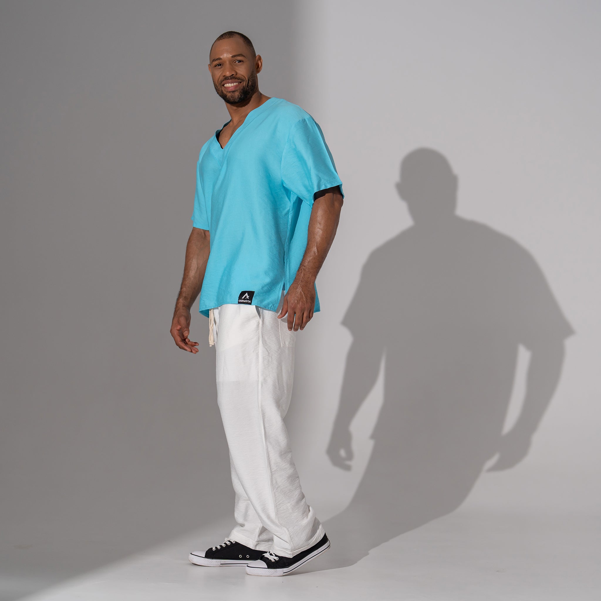 Asimetrix: Pantaloni lungi drepti din in alb