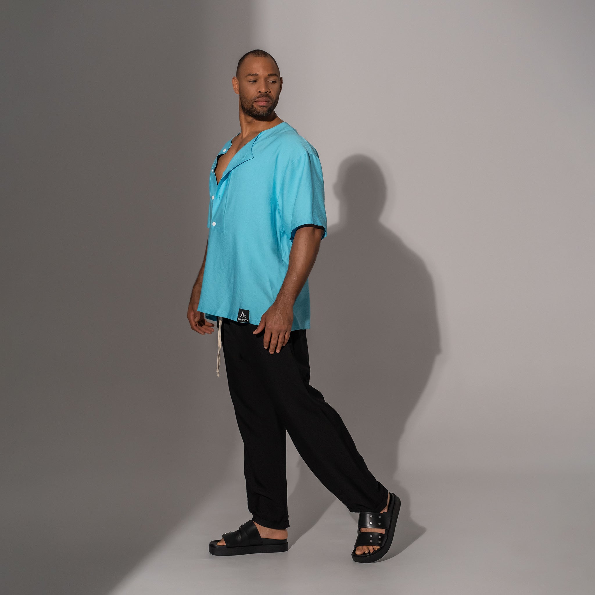 Asimetrix: Bluza long line cu nasturi si maneca scurta din in bleu