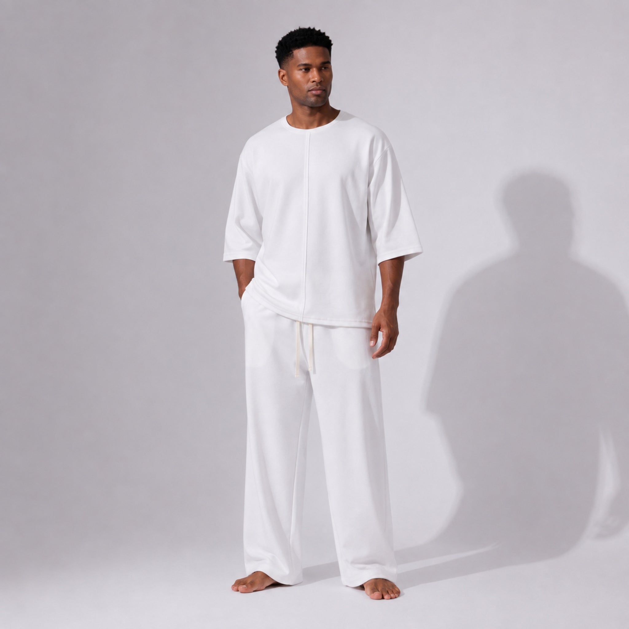 Compleu alb din bumbac cu tricou oversized cu mânecă trei sferturi și pantaloni drepți