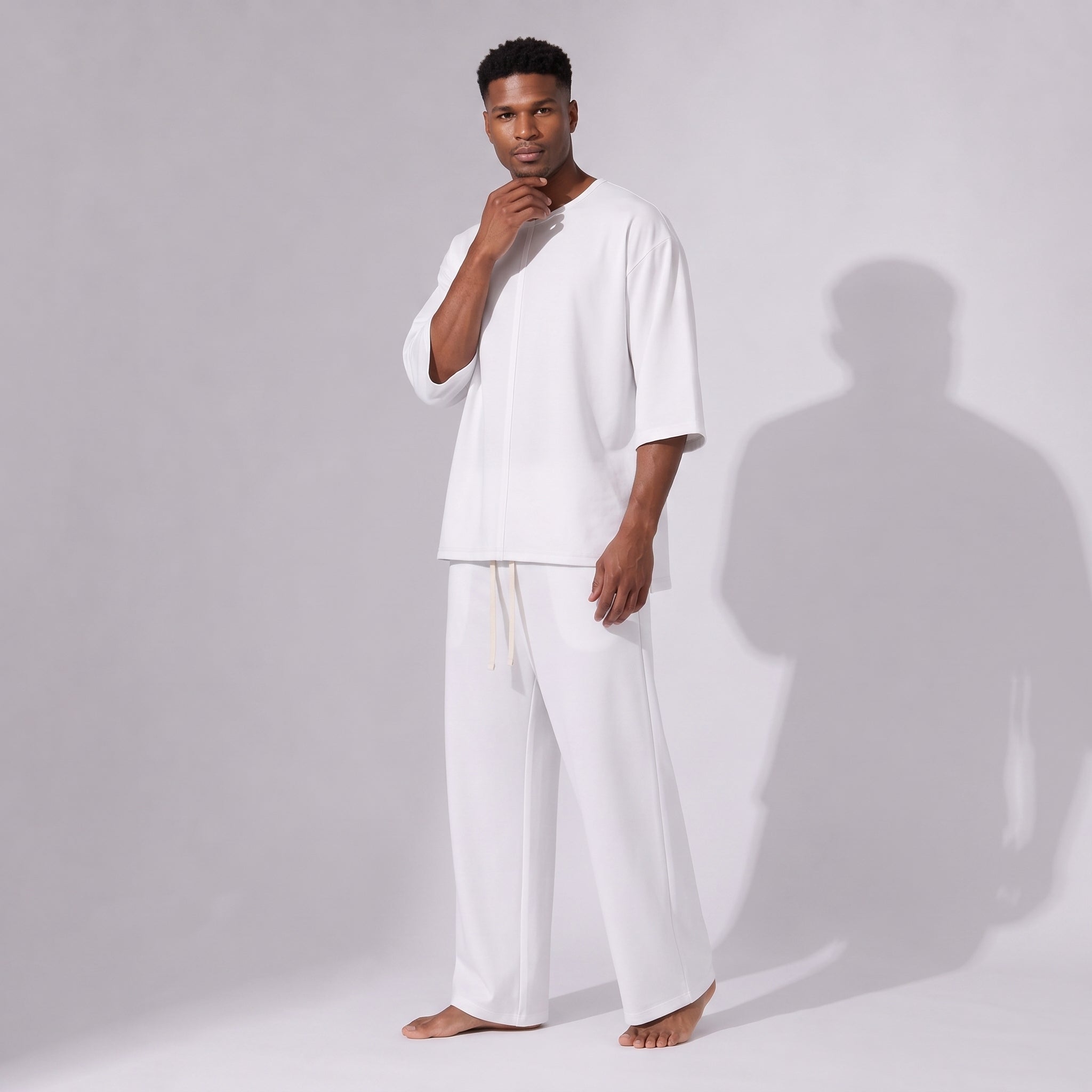 Compleu alb din bumbac cu tricou oversized cu mânecă trei sferturi și pantaloni drepți