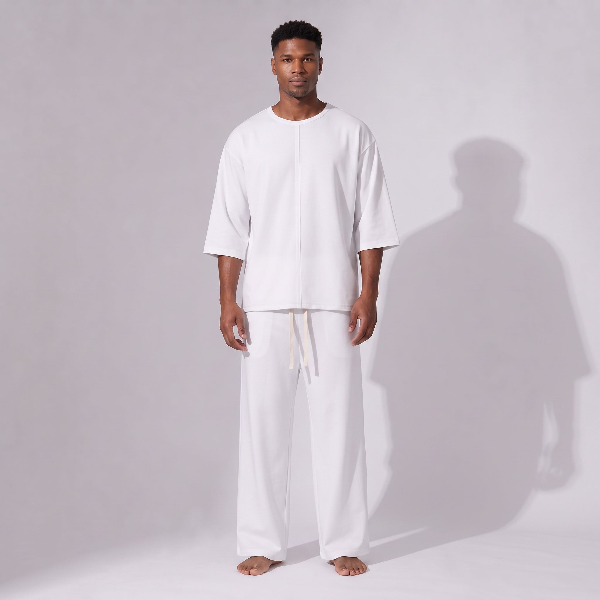 Compleu alb din bumbac cu tricou oversized cu mânecă trei sferturi și pantaloni drepți