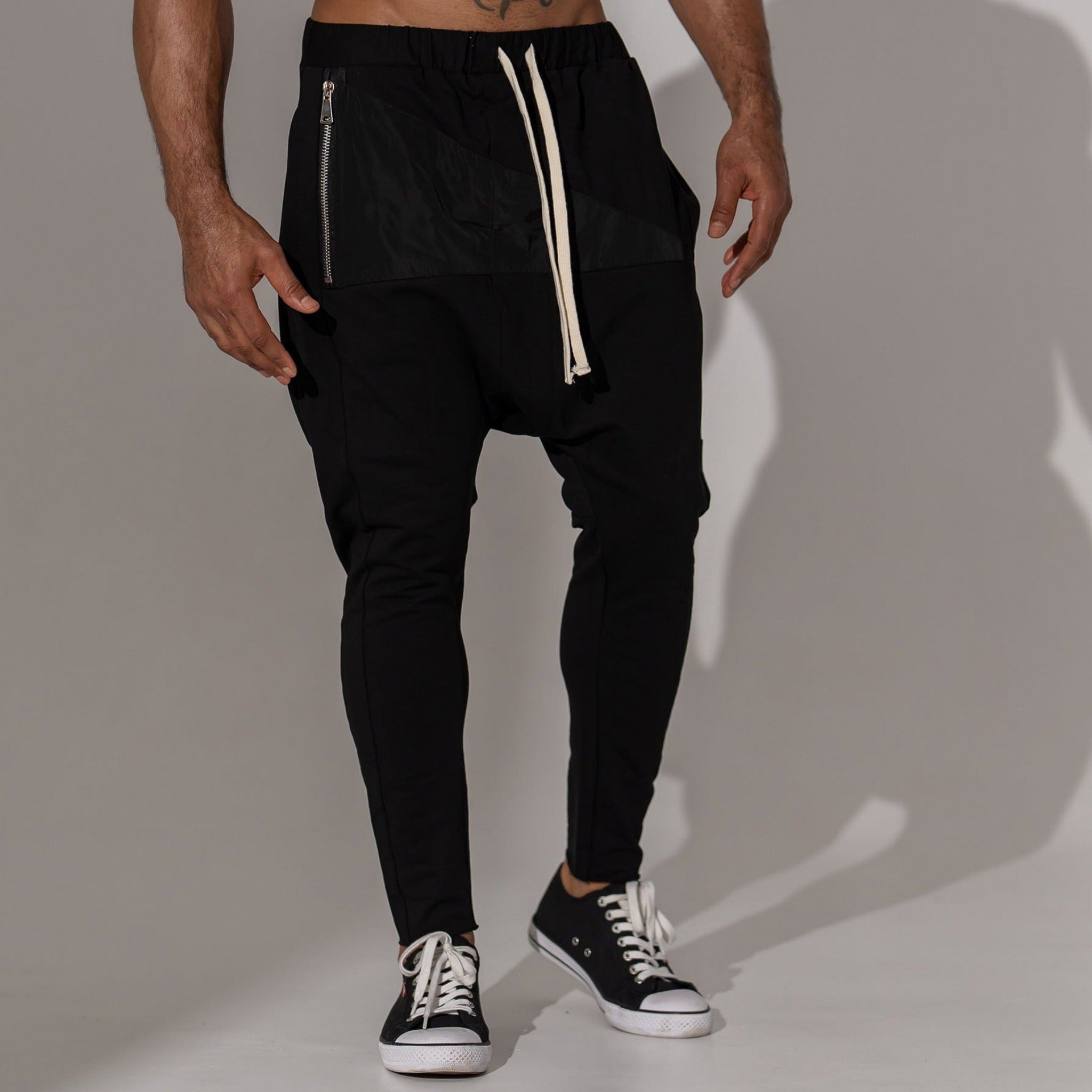 Pantaloni barbatesti conici cu tur si buzunar triunghiular din fas