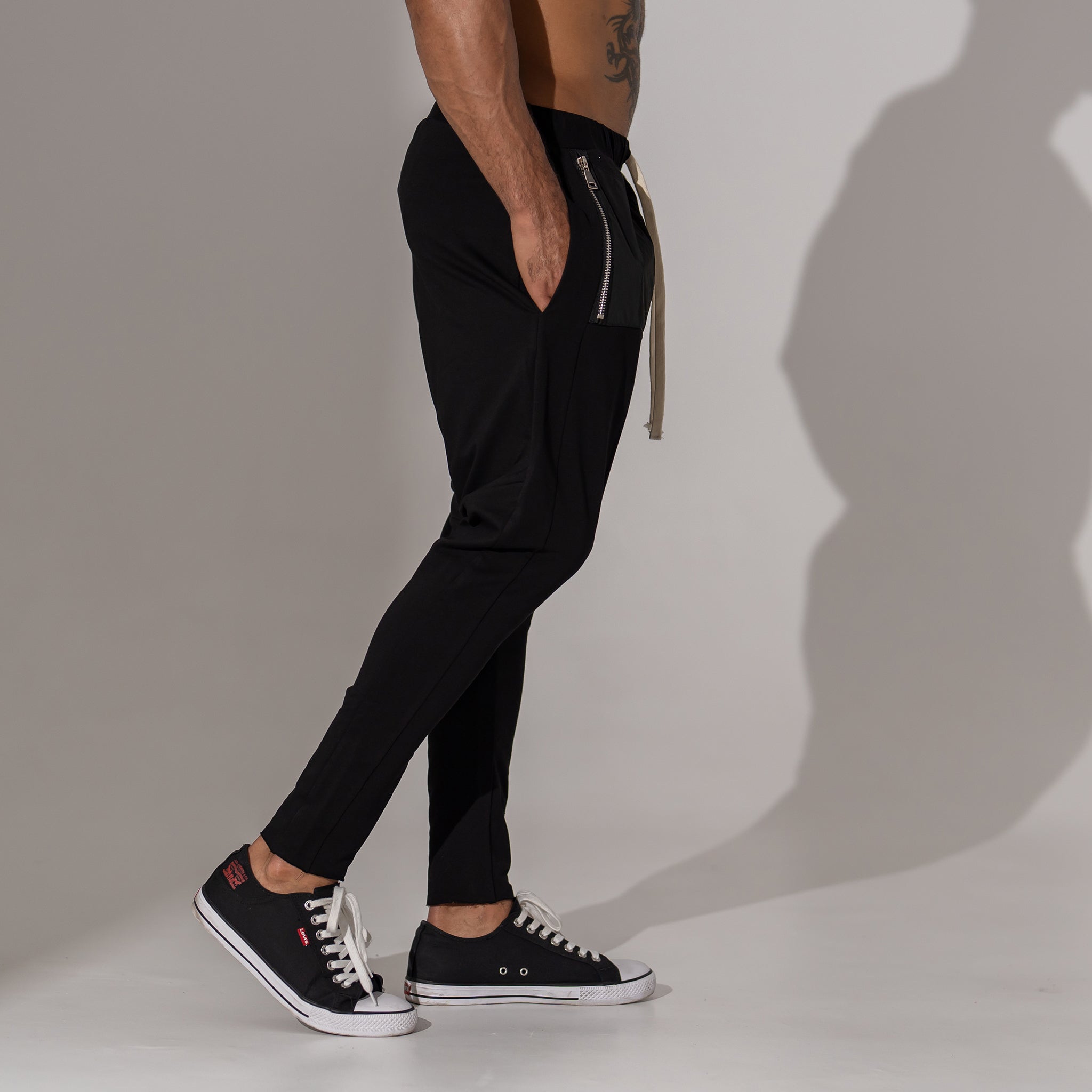 pantaloni barbatesti conici cu tur si buzunar triunghiular din fas