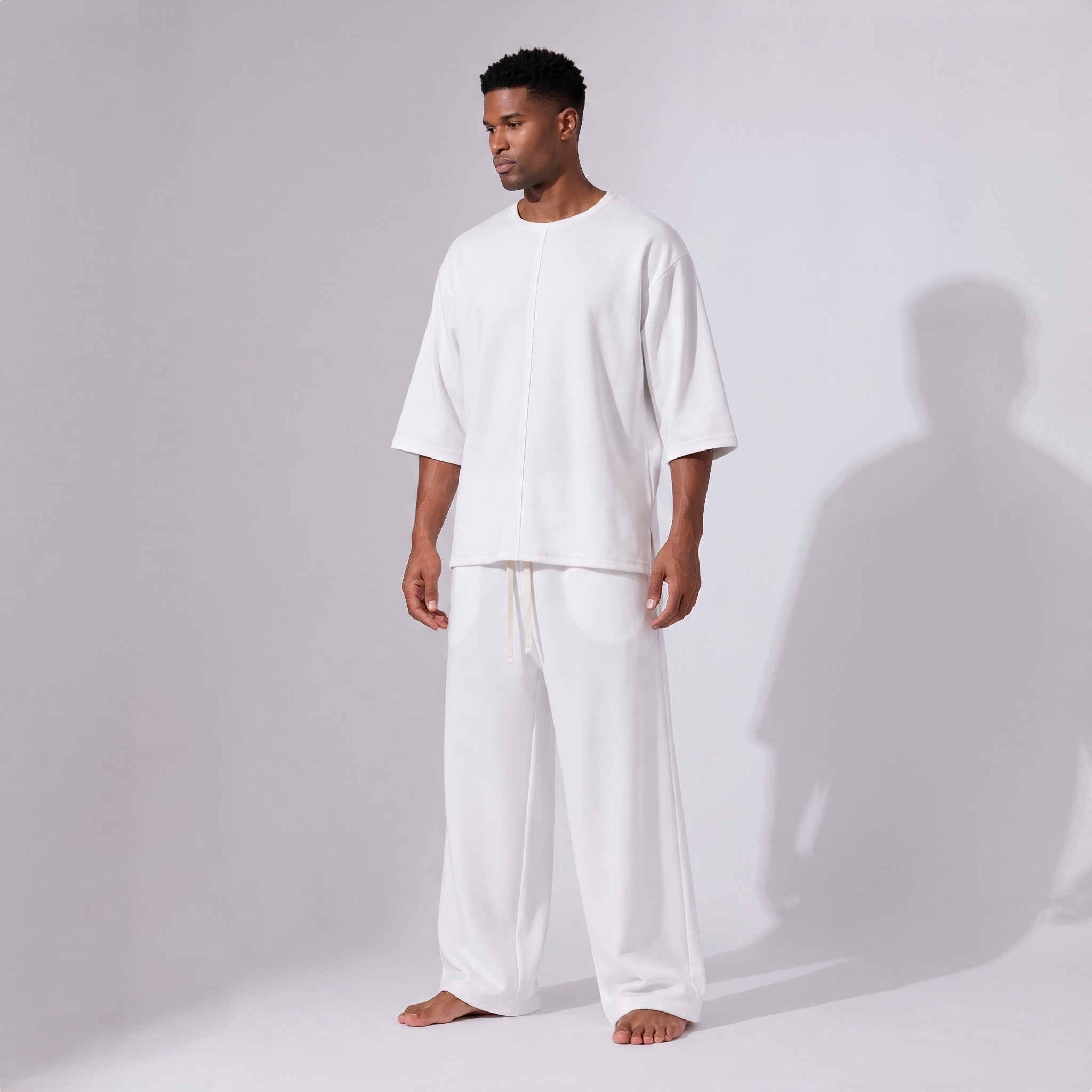 Compleu alb din bumbac cu tricou oversized cu mânecă trei sferturi și pantaloni drepți