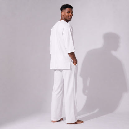 Compleu alb din bumbac cu tricou oversized cu mânecă trei sferturi și pantaloni drepți
