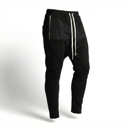 Pantaloni barbatesti conici cu tur si buzunar triunghiular din fas