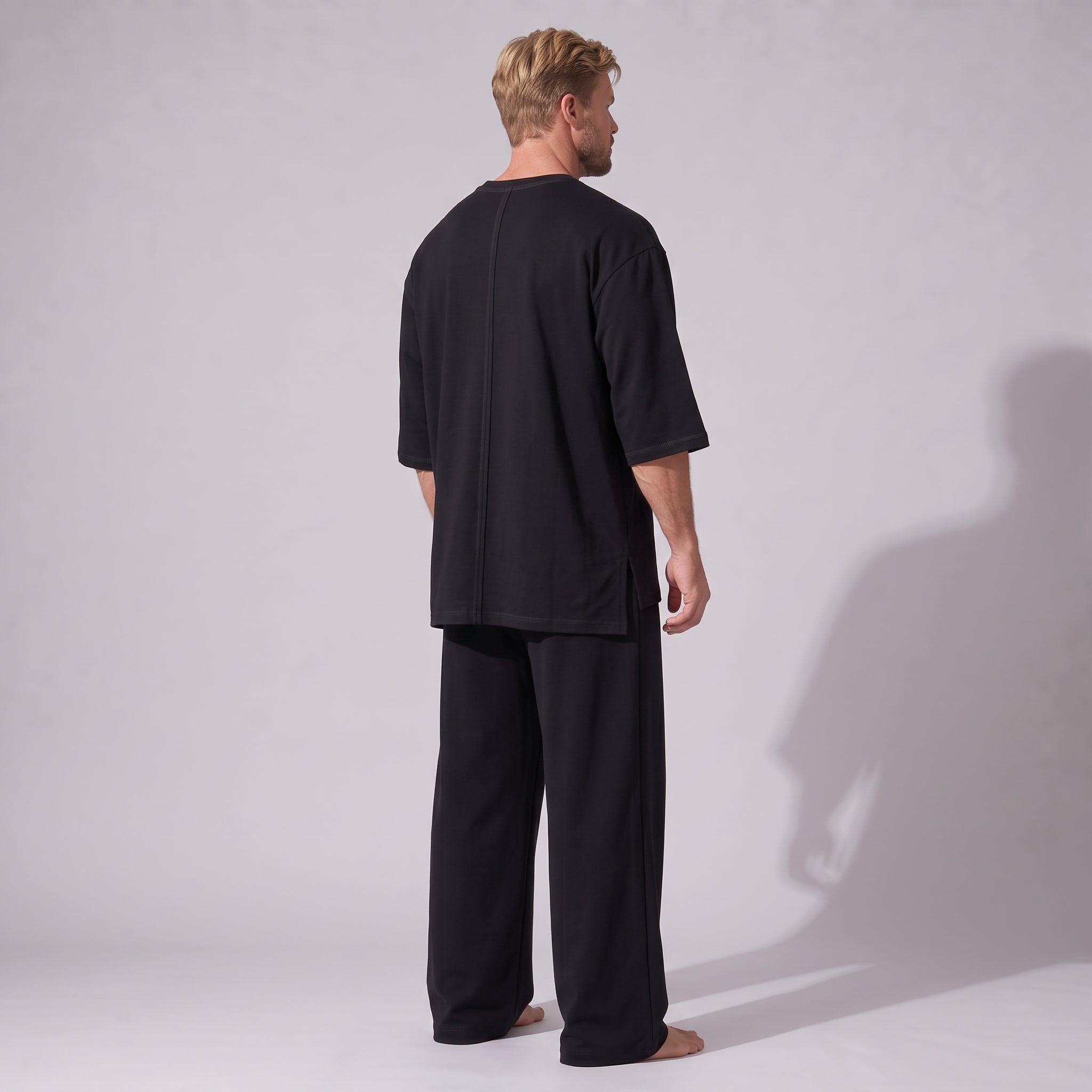 Compleu negru din bumbac cu tricou oversized cu mânecă trei sferturi și pantaloni drepți