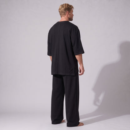 Compleu negru din bumbac cu tricou oversized cu mânecă trei sferturi și pantaloni drepți