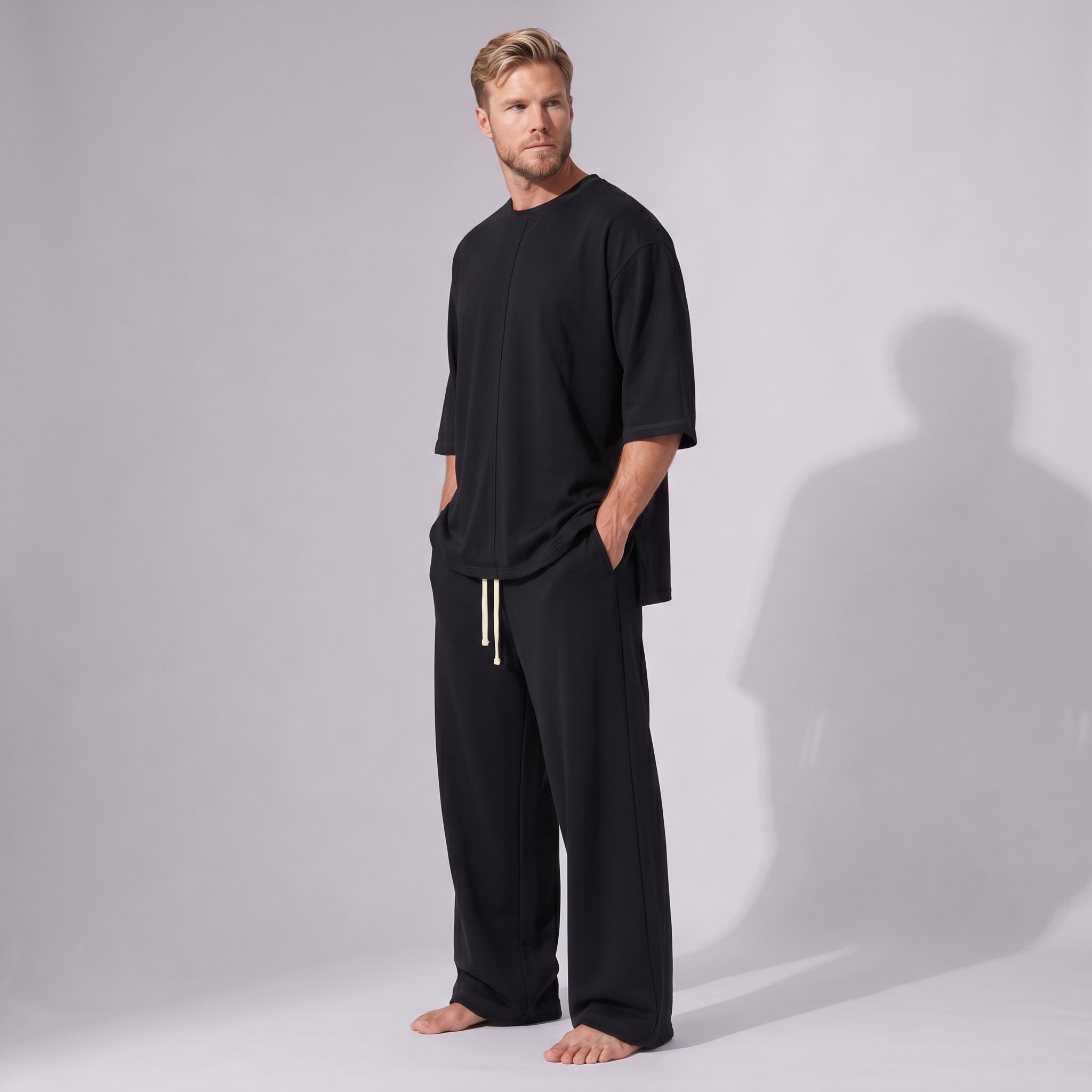 Compleu negru din bumbac cu tricou oversized cu mânecă trei sferturi și pantaloni drepți