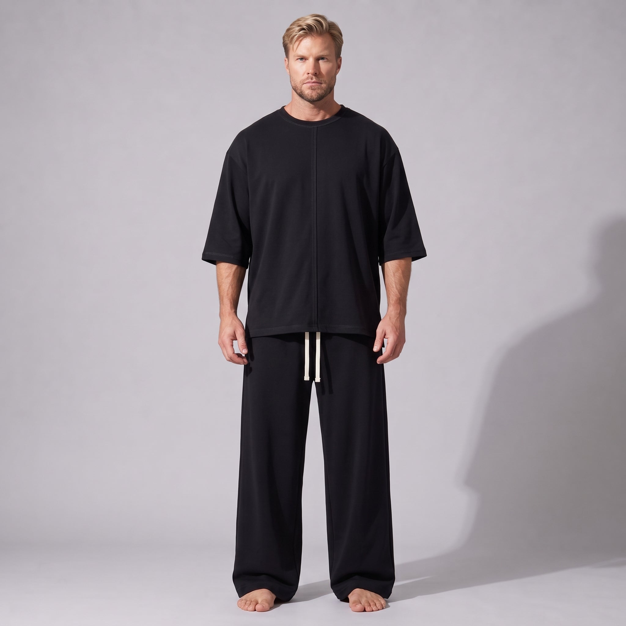 Compleu negru din bumbac cu tricou oversized cu mânecă trei sferturi și pantaloni drepți