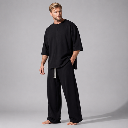 Compleu negru din bumbac cu tricou oversized cu mânecă trei sferturi și pantaloni drepți